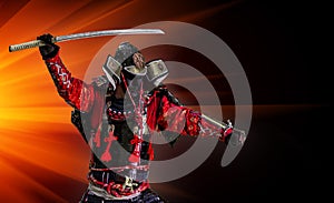 Samurai warrior with sword at sunset.