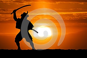 Samurai on sunset photo