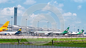 SAMUT PRAKAN, THAILAND-MAY 15, 2021 : Cargo aircraft parked at airfield in the airport near airport terminal. Cargo plane of EVA