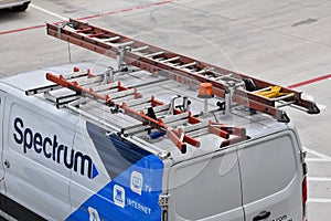 San Antonio,Texas/USA-May 23,2020:A spectrum cable television and Internet van is shown ladder and equipments parked,service