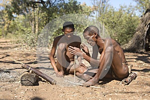 San Bushmen starting a fire