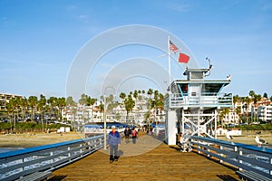 San Clemente Pier with lifeguard tower for surfer.