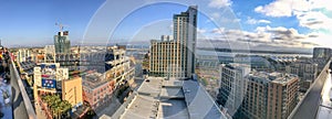 SAN DIEGO, CA - JULY 30, 2017: Tourists on a rooftop enjoy city