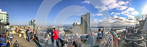 SAN DIEGO, CA - JULY 30, 2017: Tourists on a rooftop enjoy city