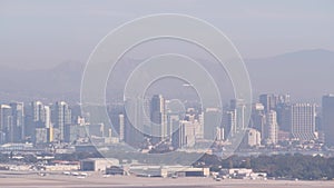 San Diego city skyline, cityscape of downtown, California Point Loma. Airplane.