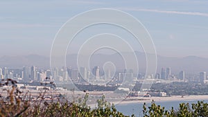 San Diego city skyline, cityscape of downtown, California Point Loma. Airplane.