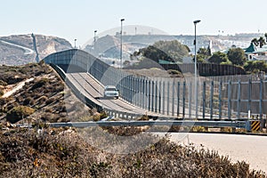 San Diego-Tijuana International Border Wall and Border Patrol Vehicle photo