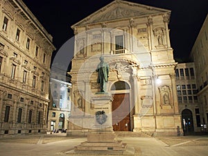 San Fedele Church, illuminated at night, statue of Alessandro Manzoni, Milan, Italy