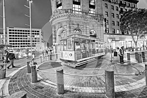 SAN FRANCISCO - AUGUST 7, 2017: Antique Cable Car on Powell Street Turntable as the car is turned around at night. It is a major