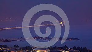 San Francisco and Bay Bridge covered with fog seen from Grizzly photo