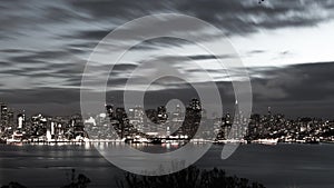 San Francisco Bay Bridge and skyline at night black and white