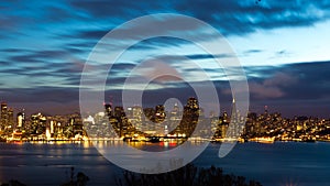 San Francisco Bay Bridge and skyline at night