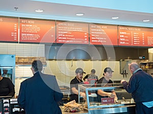 Customers served in line in Chipotle