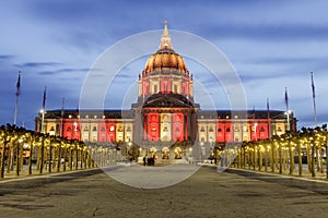 San Francisco City Hall illuminated in Gold and Red for the Chinese New Year.