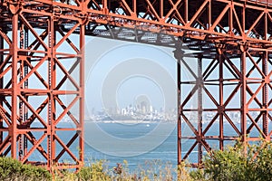 San Francisco Downtown in Hazy Summer Framed by the Golden Gate Bridge.