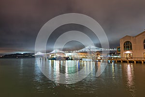 San Francisco Embarcadero and Bay Bridge at night, California, USA