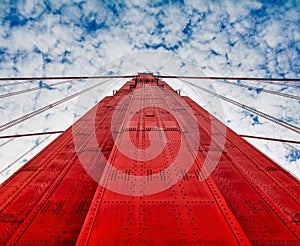 San Francisco Golden Gate Bridge North Tower looking up to the Blue Sky and Clouds