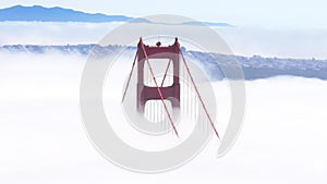 San Francisco landmark on cloudy sunny day, aerial view red Golden Gate Bridge