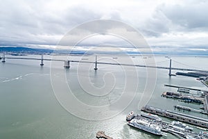 San Francisco - Oakland Bay Bridge with Cloudy Sky in Background