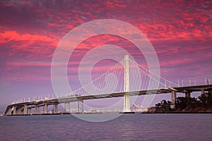 San Francisco - Oakland Bay Bridge under the purple-shaded sunset sky
