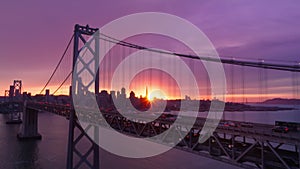 San Francisco skyline, Bay Bridge at epic pink sunset, California USA background