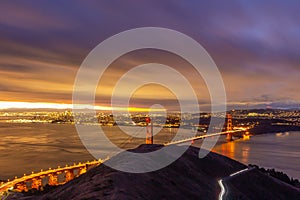 San Francisco Skyline and Golden Gate Bridge at Morning Twilight. View from Slacker Hill, California, USA photo