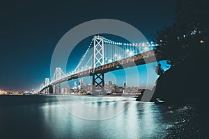 San Francisco skyline with Oakland Bay Bridge in twilight, California, USA