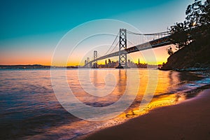 San Francisco skyline with Oakland Bay Bridge at twilight, California, USA