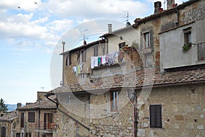 San Gimignano, Italy, ancient homes and air dried laundry