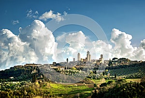 San Gimignano medieval town towers skyline and countryside landscape panorama. Tuscany, Italy, Europe.