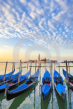 San Giorgio Maggiore church and gondolas in Venice photo