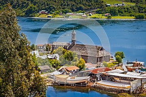 San Juan, Chiloe Island, Chile - View of San Juan and Its Shipyards and the Wooden Jesuit Church photo