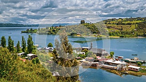 San Juan, Chiloe Island, Chile - View of the Town of San Juan and Its Shipyards and the Wooden Jesuit Church photo