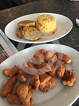 San Juan City,Puerto Rico Fish Nuggets in the house with tostones photo