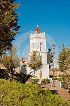 San Lucas church tower built in 1740 in the main square of the village named Toconao in an oasis at the Salar de Atacama, Atacama