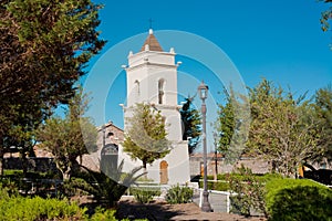 San Lucas church tower built in 1740 in the main square of the village named Toconao in an oasis at the Salar de Atacama