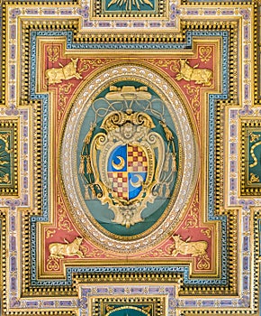 Cardinal coat of arms from the ceiling of the Church of San Marcello al Corso. Rome, Italy, photo