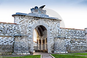 The San Marco gate in Leghorn, Italy at sunset