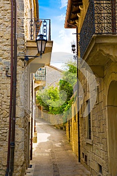 San Marino medieval street, old vintage lantern on the walls. Me