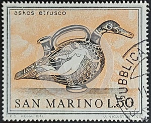 San Marino postage stamp from the Etruscan art series depicting Duck-shaped Jug with Flying Lasa