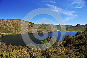 San Martin de los Andes, lake and transparent waters, with trees mountain and blue sky, Neuquen, Providencia,