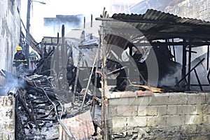 Burnt and gutted houses of fallen interior shanty houses