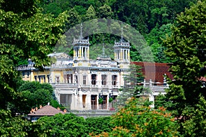 The San Pellegrino Terme casino surrounded by greenery