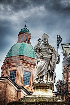 San Petronio statue in Porta Ravegnana in Bologna photo