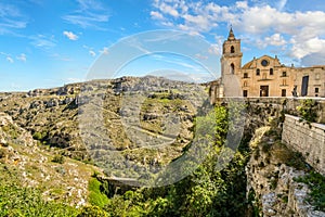 The San Pietro Caveoso church atop a canyon in ancient Matera Italy