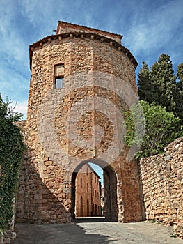 San Quirico d`Orcia, Siena, Tuscany, Italy: the medieval city gate Porta dei Cappuccini