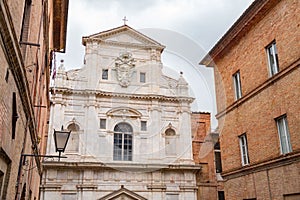 San Raimondo al Refugio is a Baroque style, Roman Catholic church located in the Terzo of Camollia of Siena, Tuscany, Italy photo