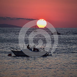 Summer sunset over Monte Igeldo and La Concha Bay photo