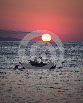 Summer sunset over Monte Igeldo and La Concha Bay photo