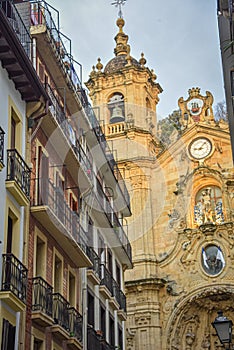 San Sebastian, Spain - the narrow streets and Basilica Church of Parte Vieja in the early morning photo